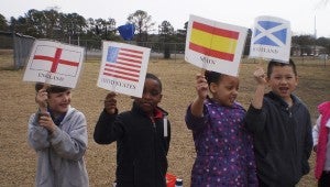  PARADE PIC: Pictured in the “Parade of Nations” are, left to right, Patrick Jansen, Isaiah Richard, Dasia Braggs and Uriel Vazquez Alvarez.