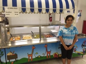 CAROLINE HUDSON|DAILY NEWS A FAMILIAR FACE: Rising ninth grader Karine Tellez, 14, comes to eat breakfast and lunch every day, Mondays through Fridays. This is her second year participating in the program.