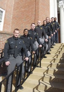 PROUD TO SERVE: Representatives of the Beaufort County Sheriff's Office gather on the steps of the Beaufort County Courthouse in Washington.