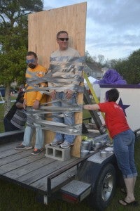 JONATHAN ROWE | DAILY NEWS STICKING IT TO CANCER: Beaufort County Schools Superintendent Dr. Don Phipps (right) and Assistant Superintendent Mark Doane were duct taped to a wall for a mini fundraiser during the 2016 Beaufort County Relay For Life event.  